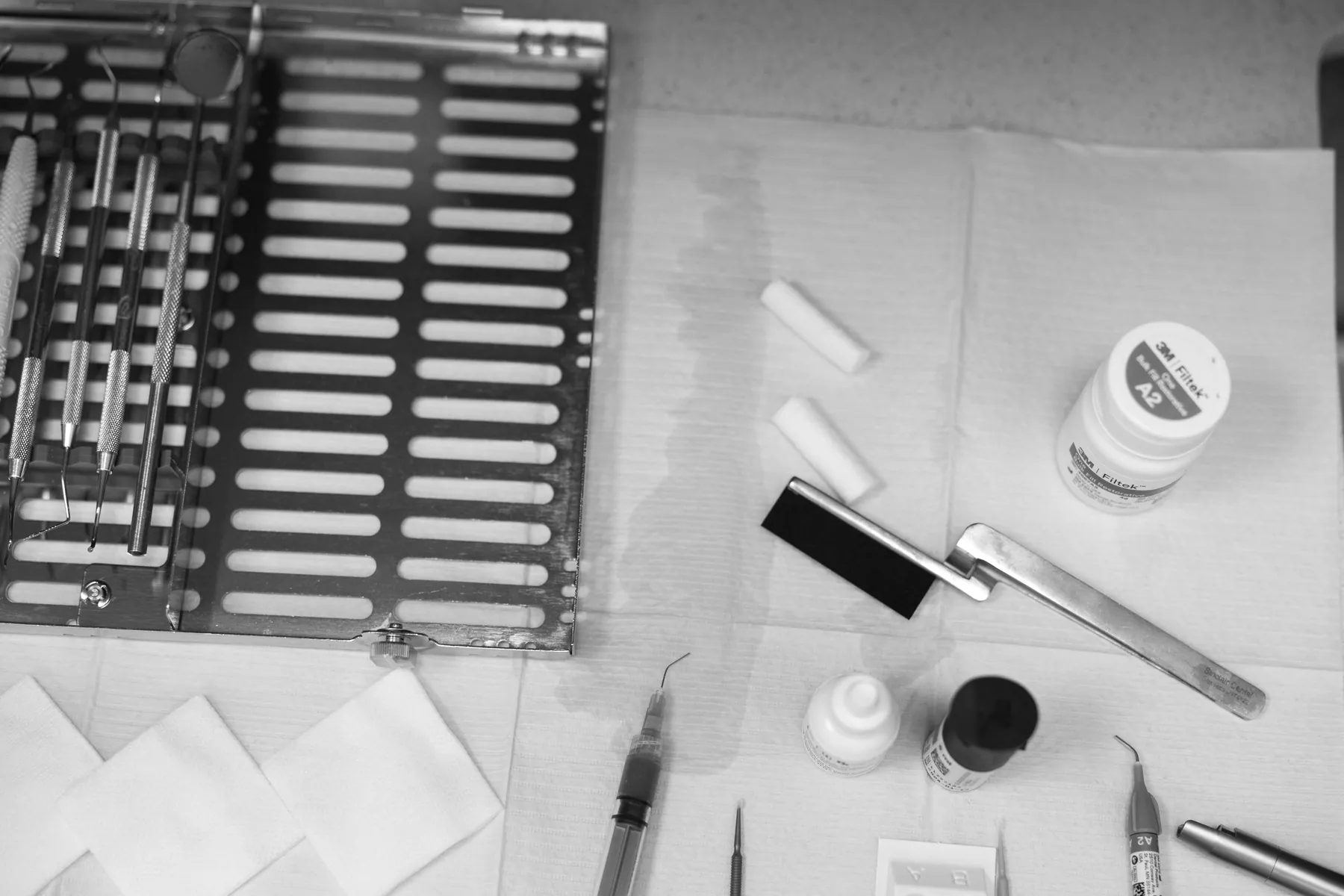 Dental instruments and supplies laid out for a procedure