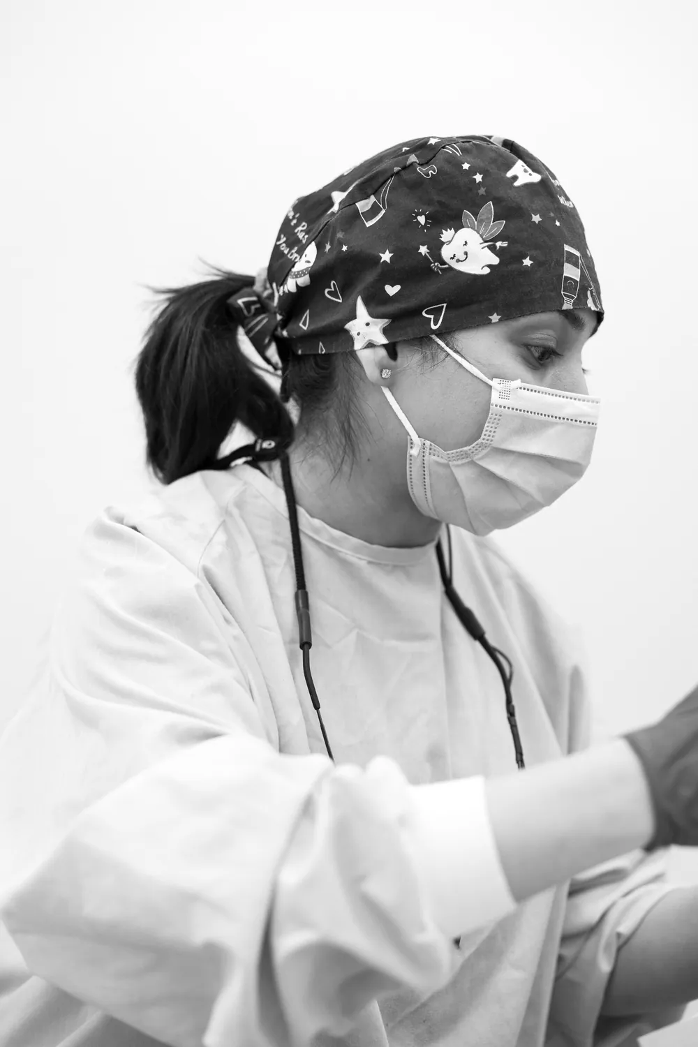 Dental assistant preparing for a procedure