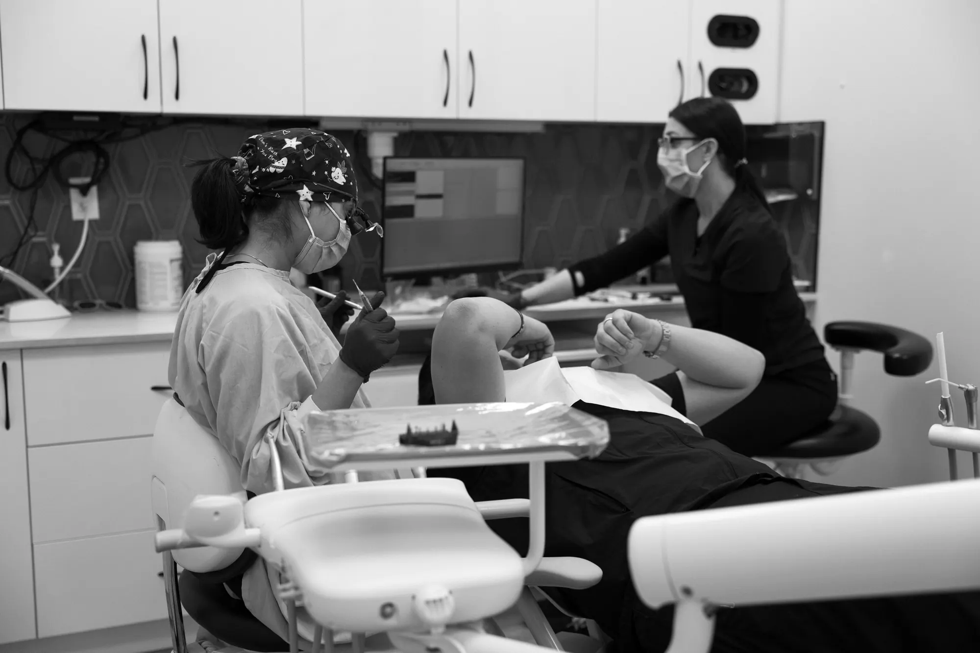 Dental team treating a patient in a Smiles @ Southgate operatory